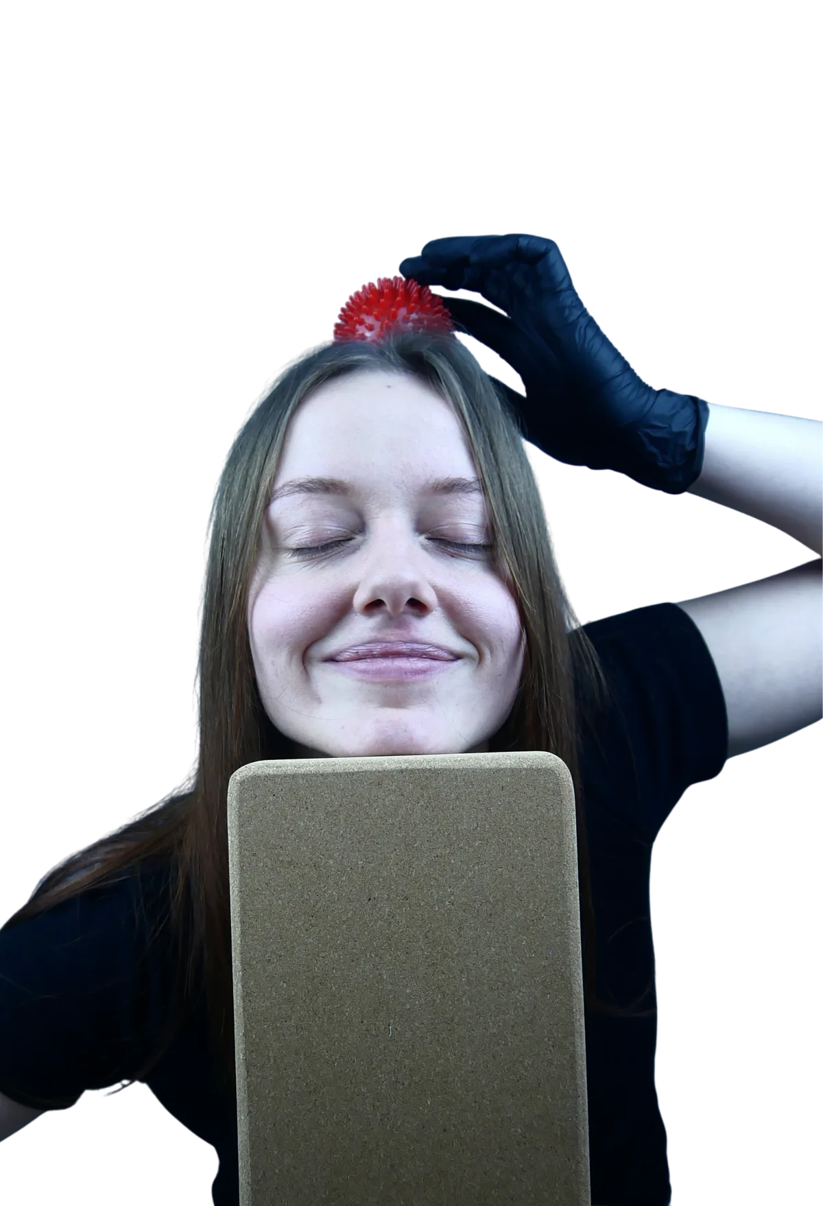 Maja smiling, holding a spiky massage ball